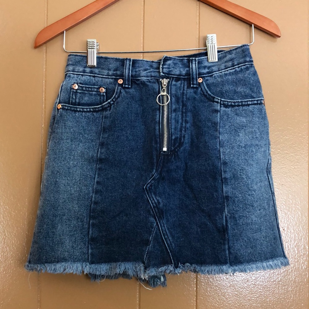 Faded jean skirt with zip up front.